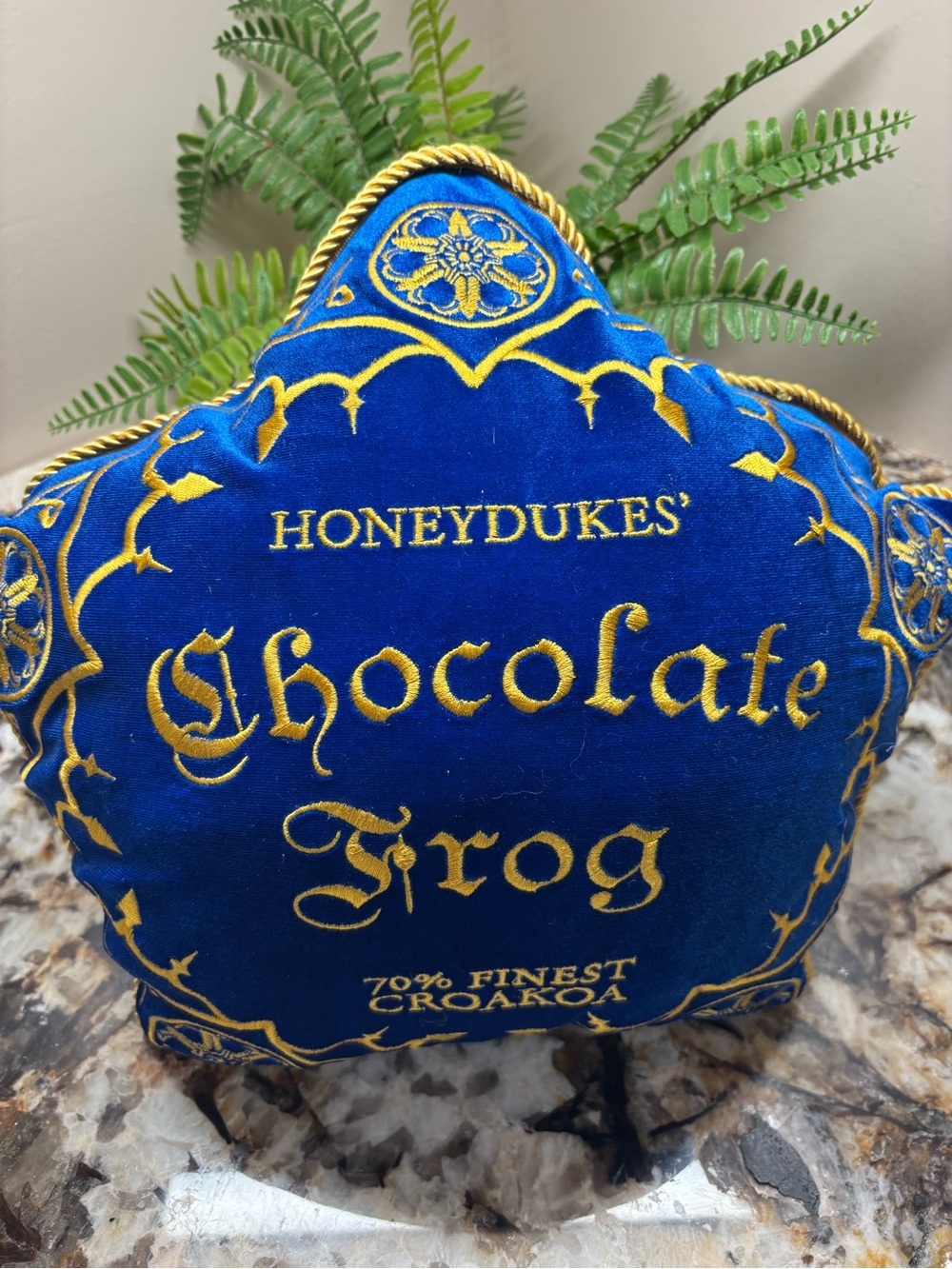 Honeydukes® Chocolate Frog Accent Pillow - with zipper frog inside